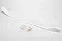 A white E-Flite UMX Radian main wing spare part with two small plastic bags containing screws and adhesive tape on a white background.