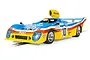 A Scalextric 1/32 scale 1977 Mirage GR8 slot car in blue, yellow, and red livery with number 10, shown on a white background.