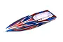 Traxxas Spartan SR assembled RC boat hull in red, blue, and white racing livery, viewed from a high angle against a white background.