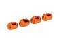 Four orange anodized aluminium suspension pin retainers for Traxxas RC vehicles arranged in a row on a white background.