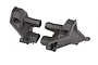 Two black plastic Traxxas rear shock tower components for an RC vehicle, shown from an angled perspective against a white background.