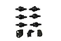 A set of black plastic RC axle housings and transmission gearbox components arranged on a white background.