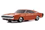 Kyosho Fazer Mk2 1970 Dodge Charger Hemi RC car in orange, studio shot on white background.