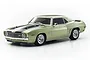 A studio shot of a 1/10 scale Kyosho Fazer Mk2 1969 Chevrolet Camaro Z28 RC car in frost green with black racing stripes.