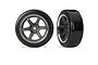 Two RC drift wheels with grey six-spoke rims and smooth black tyres isolated on a white background.