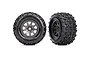 Two Traxxas Sledgehammer RC monster truck tyres mounted on charcoal grey multi-spoke wheels, shown from front and angled views.
