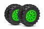 Two Traxxas Sledgehammer RC monster truck tyres mounted on bright green multi-spoke wheels against a white background.
