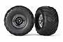 Two Traxxas 2.8 inch Terra Groove monster truck tires mounted on chrome rims against a white background.