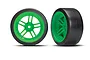 Two RC drift wheels with bright green split-spoke rims and smooth black hard plastic tyres, shown from front and angled perspectives.