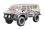 Hobby Plus CR-18P Rock Van RC crawler with a clear, unpainted polycarbonate body shell on a black chassis.