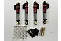 A set of four Hobby Plus oil-filled aluminium RC shock absorbers with black and red bodies, extra springs, screws, and ball studs on a white background.