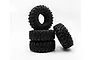 A set of four black Hobby Plus Mudder-XL RC crawler tyres stacked against a white background.