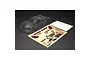 Clear unpainted polycarbonate body shell for ARRMA Kraton 1/8 scale RC truggy, including a decal sheet and window mask sheet on a black background.