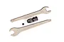 Traxxas motor coupler set including two 10mm wrenches and a small grub screw on a white background.