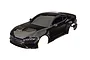 A black painted Ford Mustang RC car body shell for 1/10 scale vehicles, shown from a high angle against a white background.