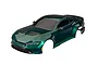 A pre-painted metallic green Traxxas 1/10 scale Ford Mustang RC car body shell viewed from a high angle against a white background.