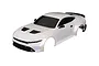 A white Traxxas 1/10 scale Ford Mustang RC car body shell, pre-painted with black trim and windows, viewed from a high angle against a white background.