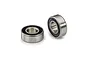 Two Traxxas 5x11x4mm rubber shielded ball bearings shown against a white background.