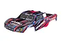 A pre-painted red, black, and blue Traxxas Slash 1/10 scale short course truck body shell on a white background.