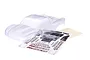 A clear, unpainted Traxxas Slash 1/10 scale RC short course truck body shell with an included decal sheet on a white background.