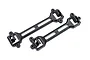 Two black plastic Traxxas body latch mounts shown from an overhead angle against a white background.