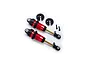 Two Traxxas GTR long shock absorbers in red anodized aluminum with black plastic components and mounting hardware on a white background.