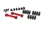 A set of Traxxas red anodized aluminium suspension mounts and various grey plastic hinge pin retainers and spacers on a white background.