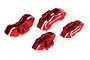 Four red anodized aluminium brake caliper replicas for Traxxas RC vehicles, featuring silver machined edges and Traxxas branding.