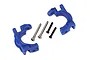 Two blue Traxxas heavy duty C-hub carriers with two silver hinge pins and two black screws on a white background.
