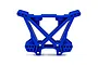 A blue Traxxas rear shock tower made of molded plastic, featuring multiple mounting holes for suspension adjustment.