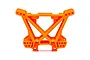 A bright orange Traxxas rear shock tower made of molded plastic, shown against a plain white background.
