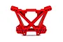 A red Traxxas rear shock tower made of molded plastic, featuring a triangular support structure and multiple mounting holes.