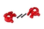 Two red Traxxas extreme heavy duty steering hubs with two black metal screws on a white background.