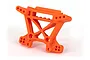 An orange Traxxas Extreme Heavy Duty front shock tower for RC vehicles, shown from a three-quarter angle against a white background.