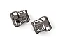 Two black chrome Traxxas differential covers for RC vehicles, shown from a top-down angle against a white background.