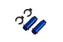 Two blue anodized aluminium GTM shock bodies and two black plastic spring preload spacers on a white background.