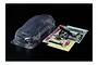 A clear, unpainted Tamiya 1/10 scale Subaru WRX STI NBR Challenge RC body shell with included decal sheets and plastic parts tree.
