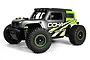 Maverick Doha 1/20 scale RC desert truck in green and grey, featuring off-road tires, a roll cage, and detailed body graphics on a white background.