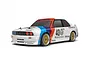 HPI Racing 1/10 scale RC touring car featuring the iconic 1987 Warsteiner BMW E30 livery with white, blue, and red racing decals.