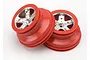 Two Traxxas RC short course wheels with red plastic rims and satin chrome centers, shown from an angled perspective against a white background.