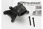 Traxxas Revo wheelie bar mount part with two mounting screws and instruction sheet in the background.