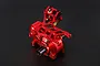 A red anodized aluminium gear differential transmission assembly for a 1/5 scale RC car, shown against a dark background.