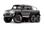 A studio shot of a dark grey Traxxas TRX-6 Mercedes-Benz AMG G 63 RC rock crawler truck on a white background.