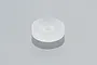 A single small, translucent white silicone gasket or washer for an RC boat, shown on a plain grey surface.