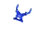 A blue anodized aluminium front bulkhead for an RC car by GPM Racing, featuring a Y-shaped design with mounting holes and the GPM Racing logo.