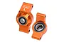 A pair of orange anodized aluminium rear hubs for RC cars by GPM Racing, featuring pre-installed ball bearings.