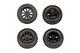Four black RC short course wheels with multi-spoke rims and off-road tread patterns, shown from front and rear angles.
