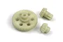 A set of three off-white plastic RC gears including one large spur gear and two smaller pinion-style gears on a white background.