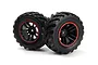 Two BlackZon Spryte RC monster truck wheels with black rubber tyres and black rims featuring red accent rings.