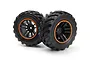 Two BlackZon Spryte RC car wheels with black rubber tyres and black rims featuring orange accents, shown against a white background.